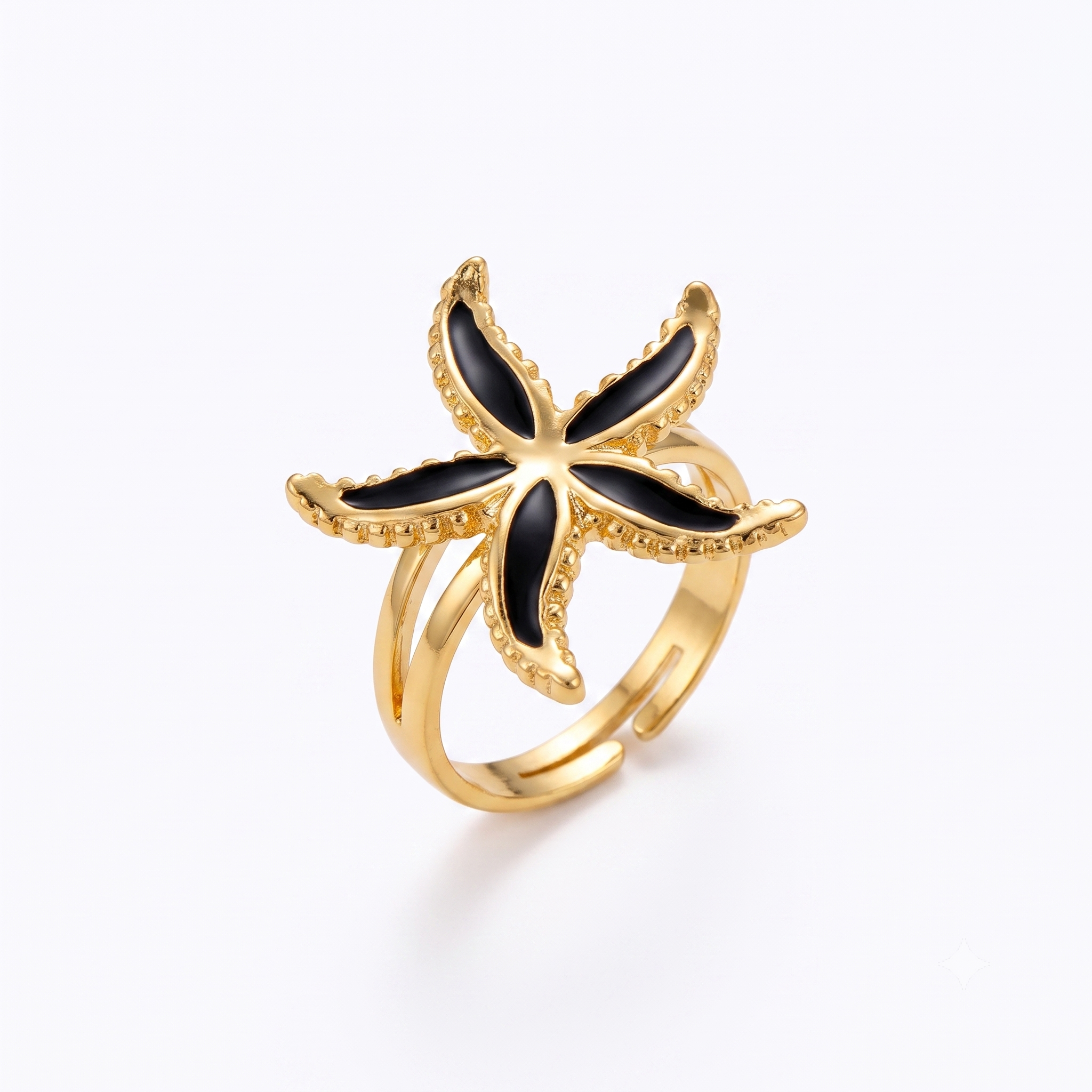 Bague ajustable en acier inoxydable doré avec motif étoile de mer noire émaillée, bijou marin élégant résistant à l'eau.