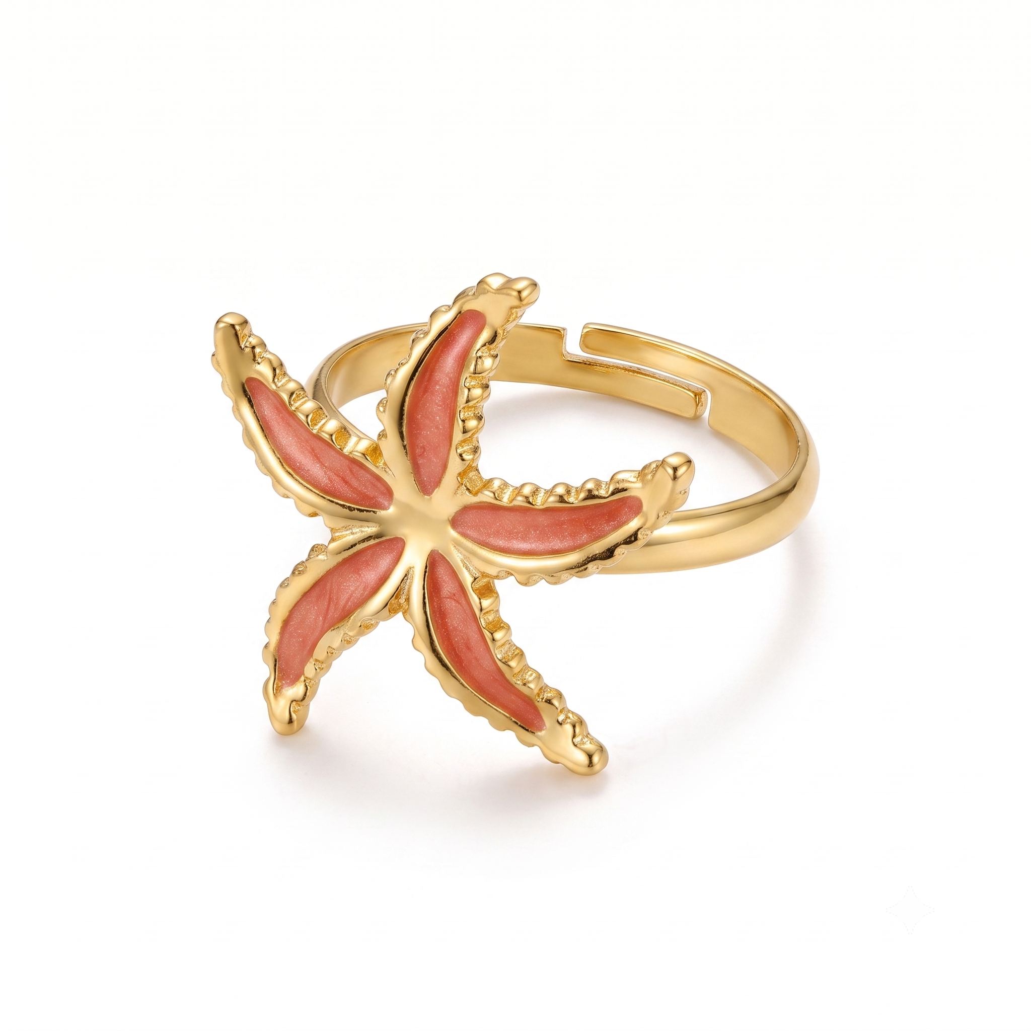 Bague ajustable en acier inoxydable doré avec étoile de mer émaillée rose, bijou inspiré de l’univers marin, élégant et résistant à l’eau.