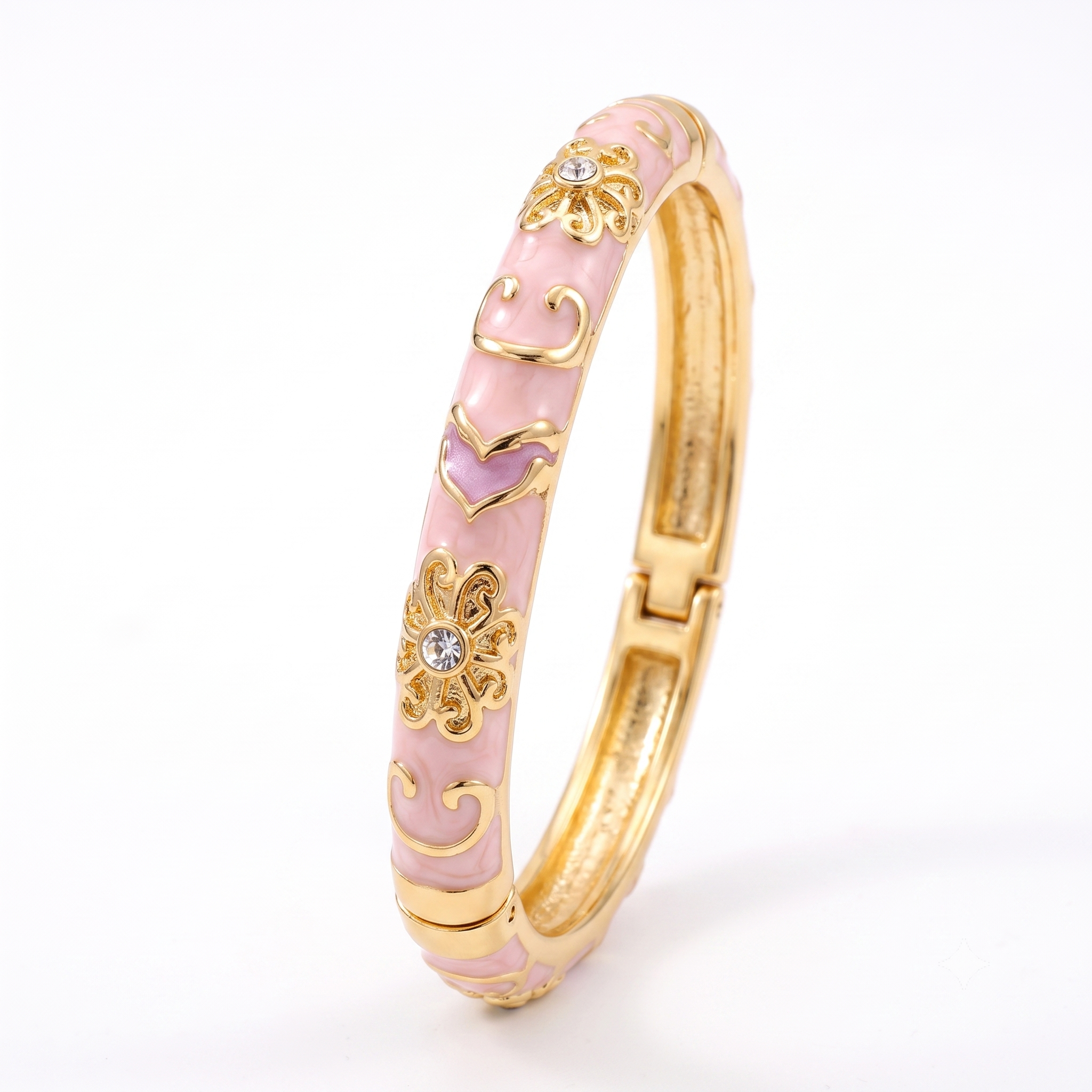 Bracelet jonc en acier inoxydable doré avec émaillage rose, motifs floraux et cristaux, bijou élégant résistant à l'eau.