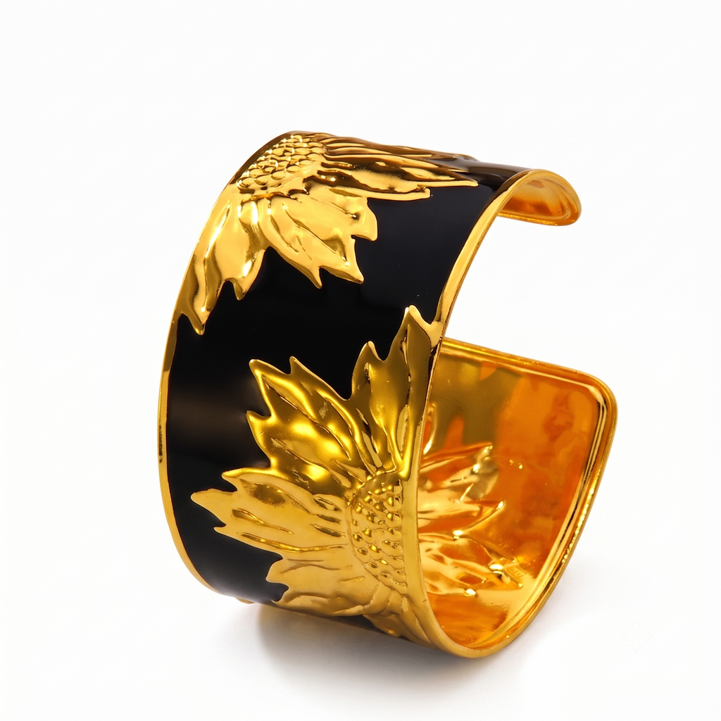 Bracelet Eden Noir en acier inoxydable noir et doré avec motifs tournesols, bijou élégant pour femme résistant à l'eau.
